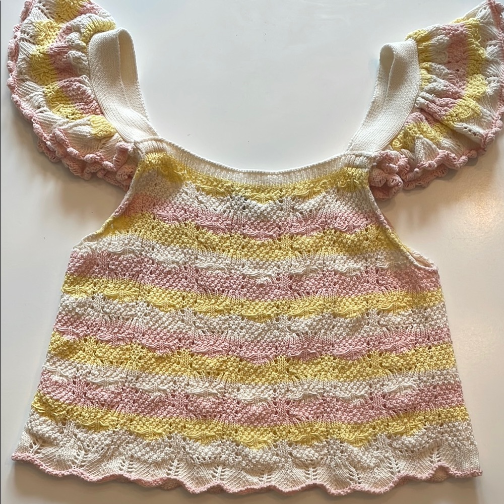 Knit top with ruffled sleeves